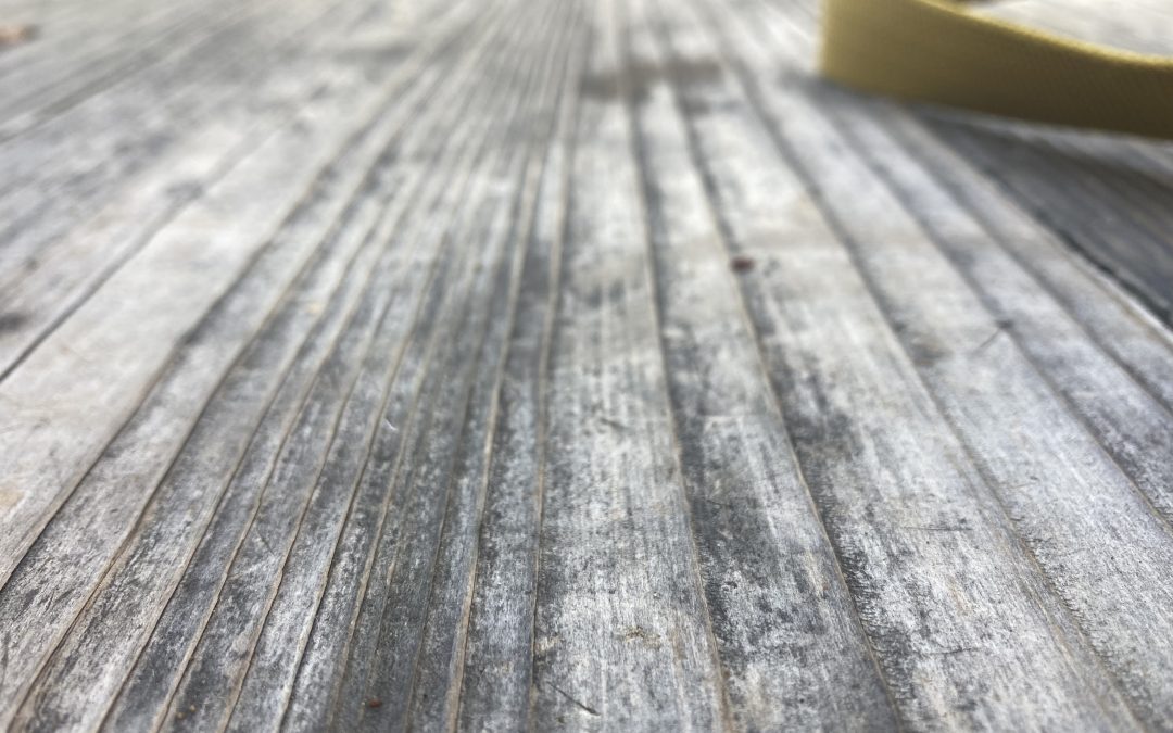 wood planks line a floor